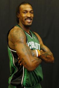 Bobcats forward Gerald Wallace models the green uniform the team will wear as part of the NBA's Green Week. The Bobcats will wear green tonight against the Miami Heat and Tuesday night for the regular season home finale against Philadelphia. KENT SMITH/CHARLOTTE BOBCATS